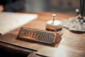 A motel reception sign
