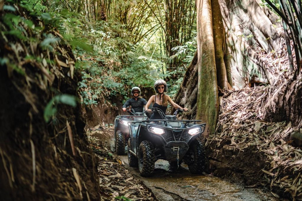 Two people doing ATV trails