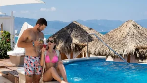 A couple at a boutique hotel pool