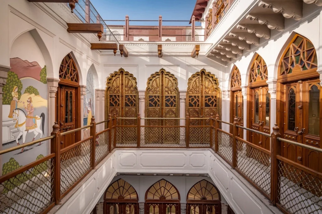 Intricate traditional courtyard with ornate golden doors