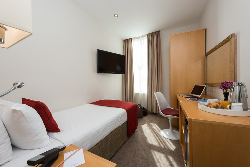 A basic single room in a hotel