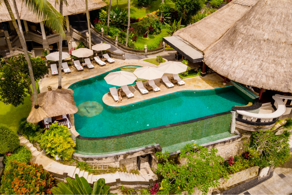 Aerial view of the main pool at Viceroy Bali, a luxury honeymoon resort.