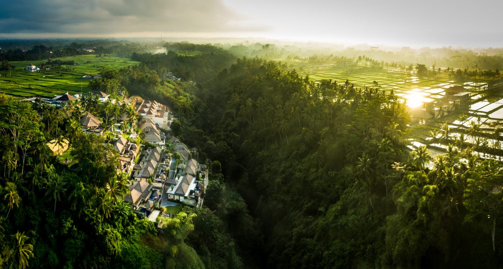 A luxury resort in Ubud, Bali overlooking a jungle filled ridge