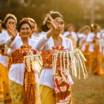 Balinese women in traditional clothing at a holiday ceremony