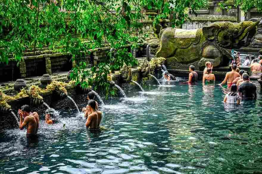 place to visit near to viceroy bali - piritual Purification Ritual at Tirta Empul Temple Tampaksiring Highlands